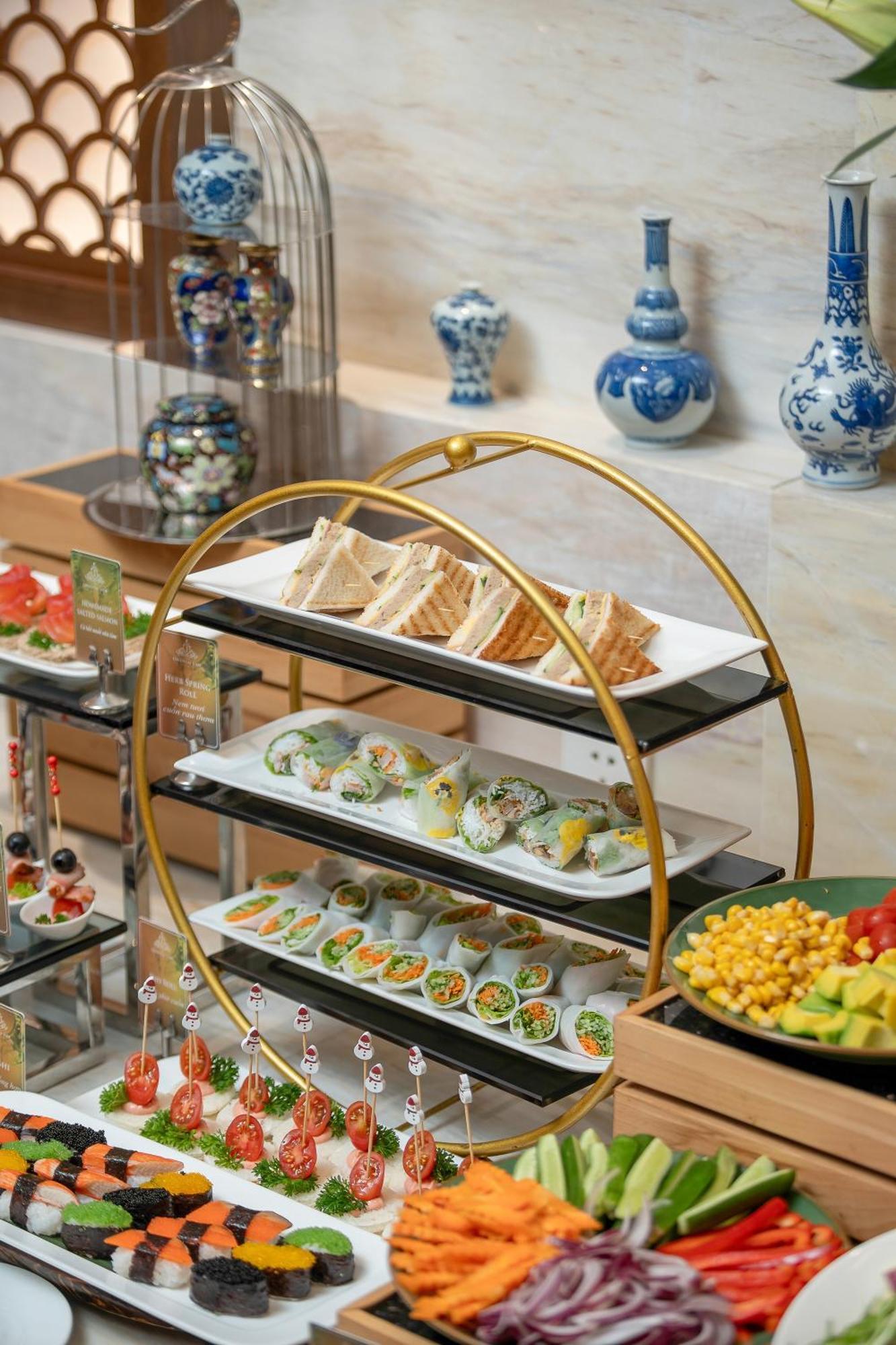 The Oriental Jade Hotel Hanoi Exterior photo A three-tiered serving tray