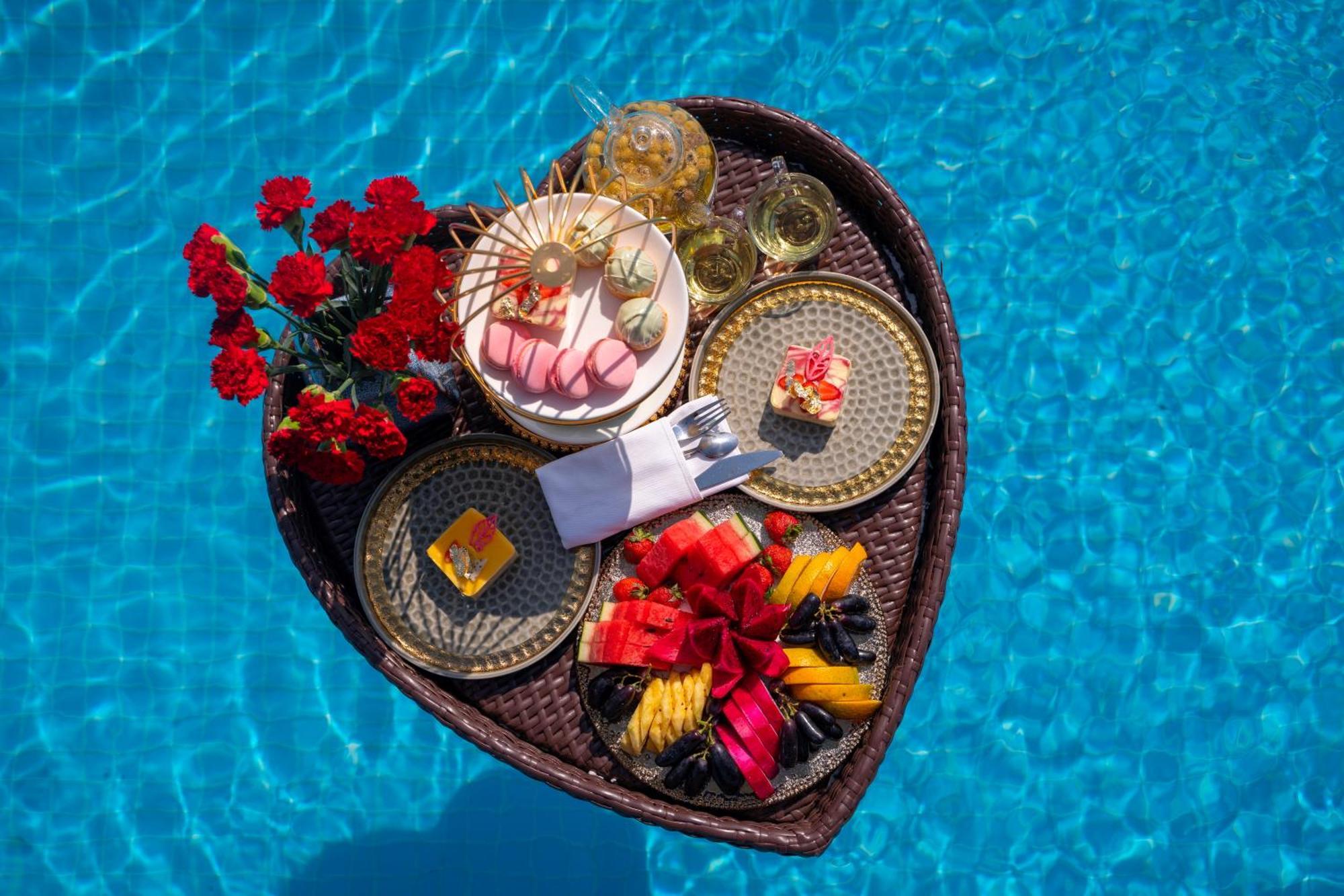 The Oriental Jade Hotel Hanoi Exterior photo A floating breakfast tray at a resort in Bali, Indonesia