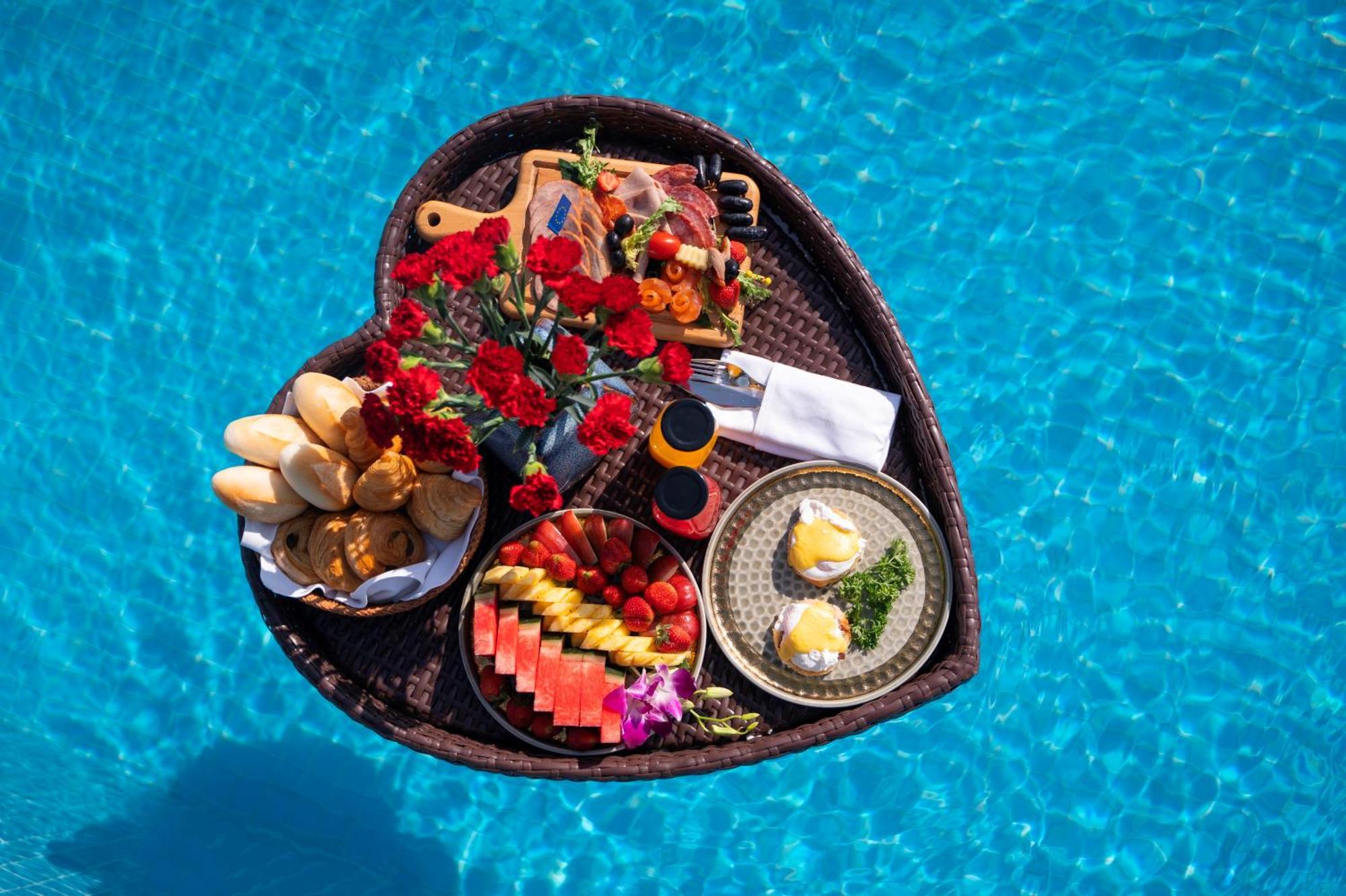 The Oriental Jade Hotel Hanoi Exterior photo A floating breakfast at a resort in Bali, Indonesia