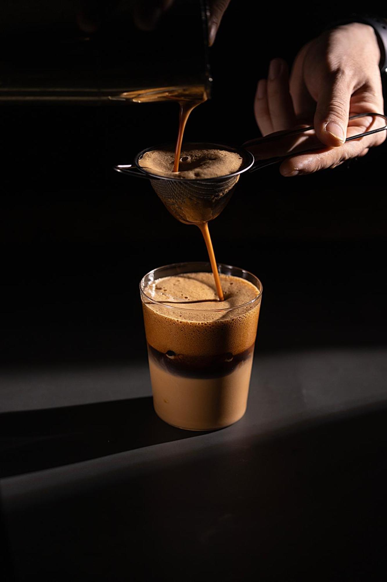The Oriental Jade Hotel Hanoi Exterior photo A coffee being poured into a glass